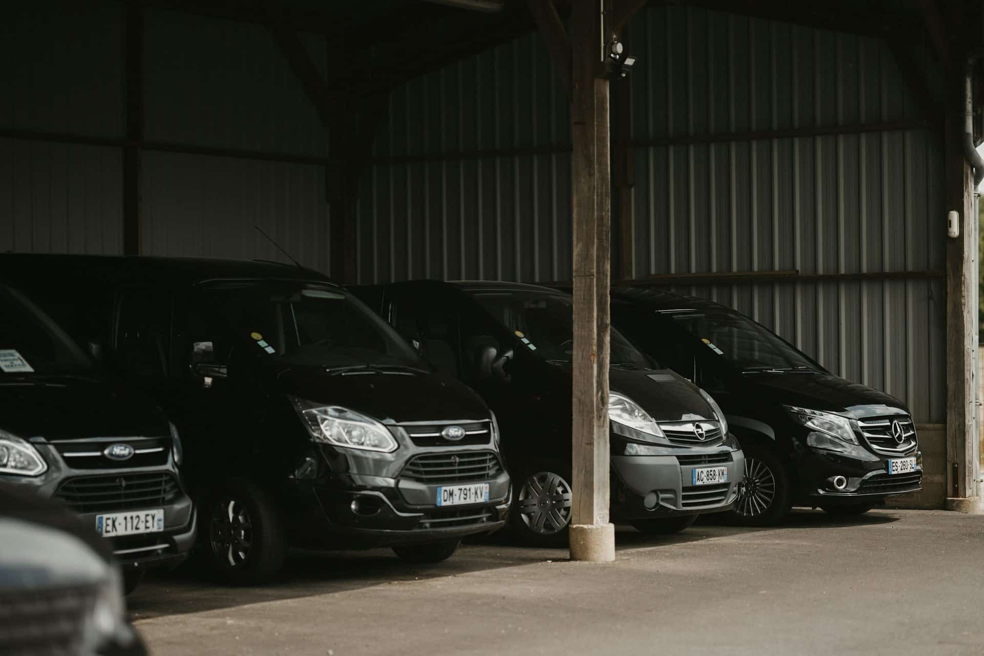 Four work vehicles representing a settled business fleet facility